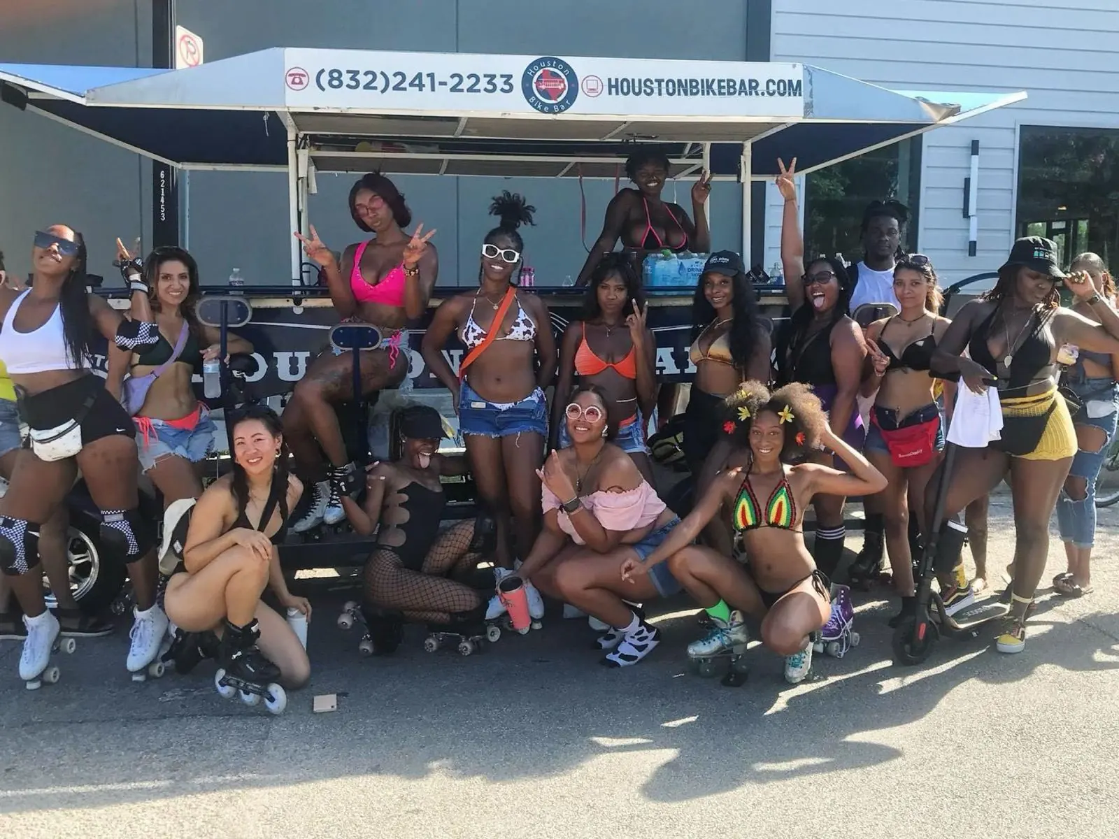 A group in roller skates riding the Houston Bike Bar